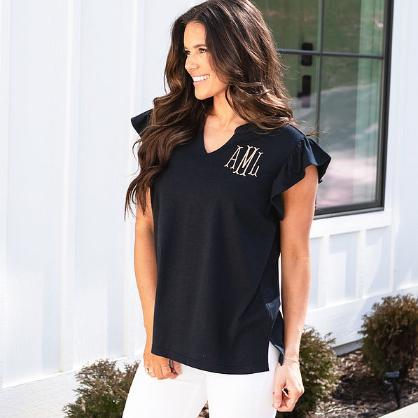 black flutter sleeve top on peyton