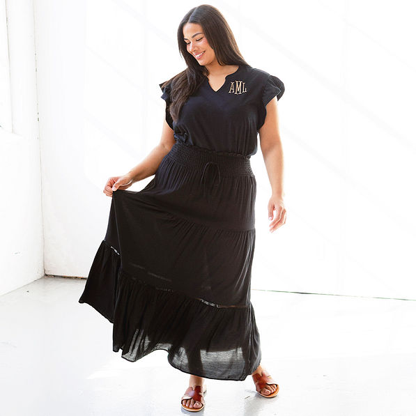 black flutter sleeve top with midi skirt