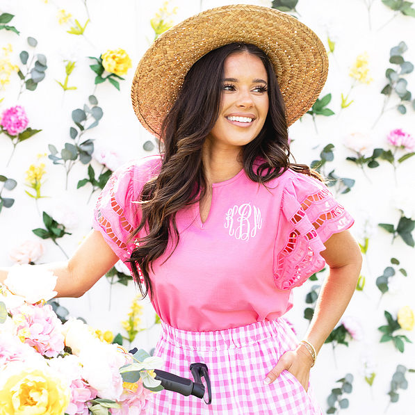 pink flutter sleeve top on peyton with flowers