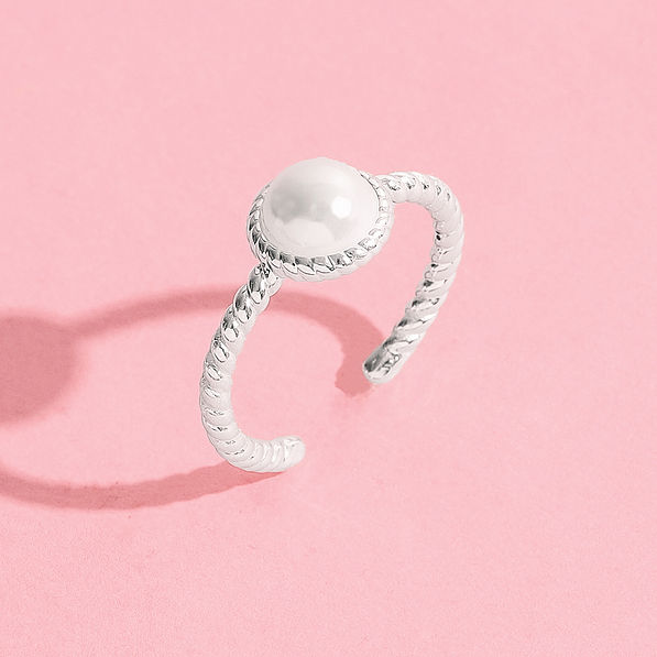 pearl silver adjustable ring on pink background