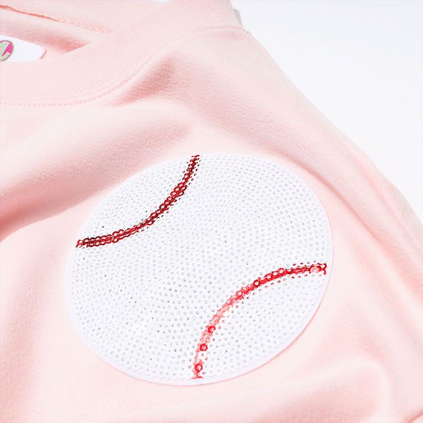 light pink sequin sports sweatshirt up close
