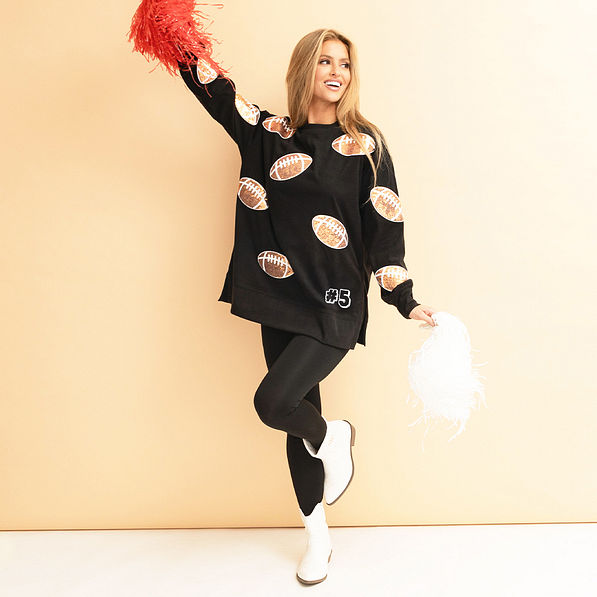 football sequin sports sweatshirt on rachel with pom poms