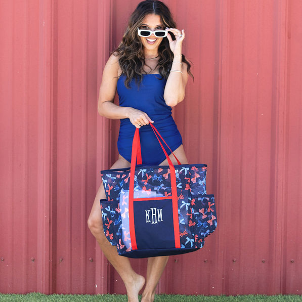girl carrying personalized mesh tote in americana bows