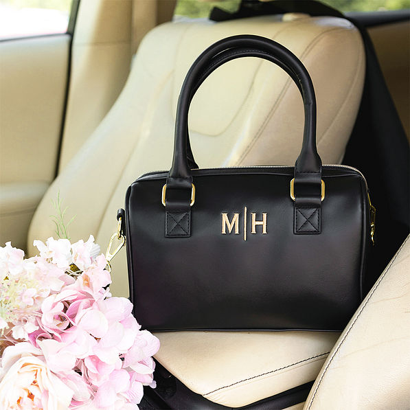 black harper handbag in car new