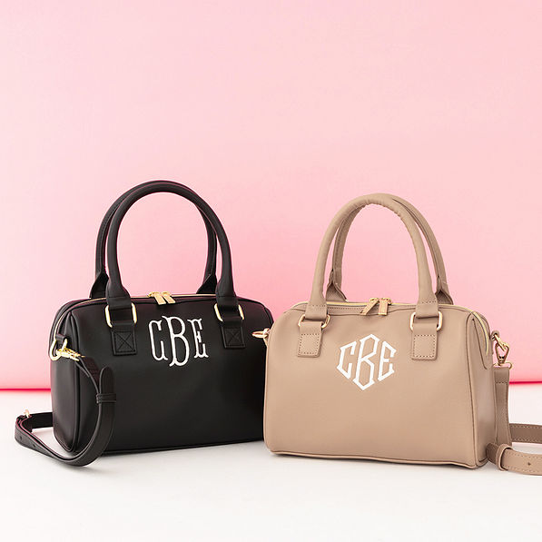 duo harper handbags in black and tan