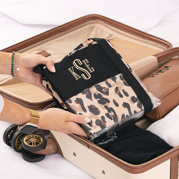 folded monogrammed clear beach tote in classic cheetah in luggage