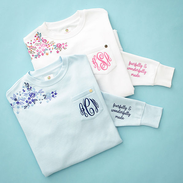 duo faith sweatshirts flatlay