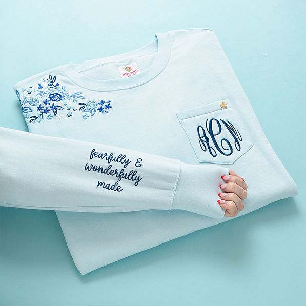 ice blue faith sweatshirt flatlay