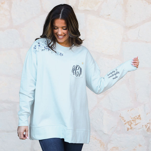 ice blue faith sweatshirt on peyton