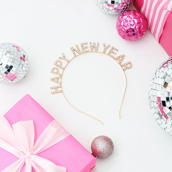 new year headband flatlay with gifts