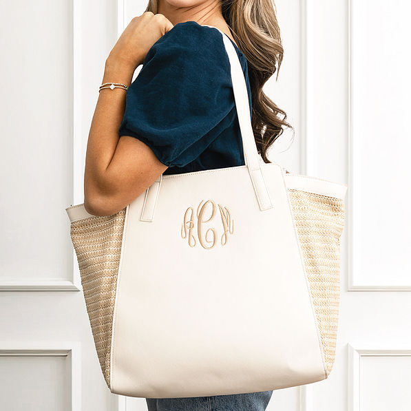 bone tropical travel tote on shoulder