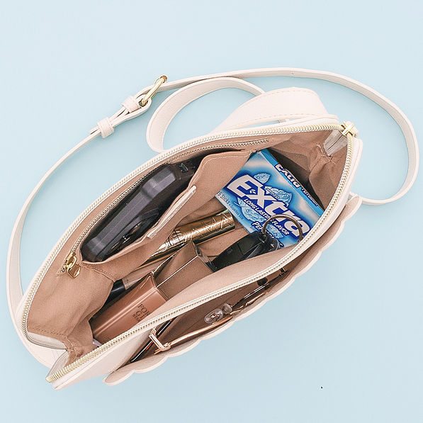 inside of bone oversized crossbody purse