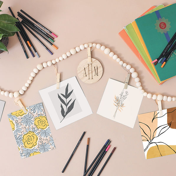 art clipped to monogrammed wooden photo garland