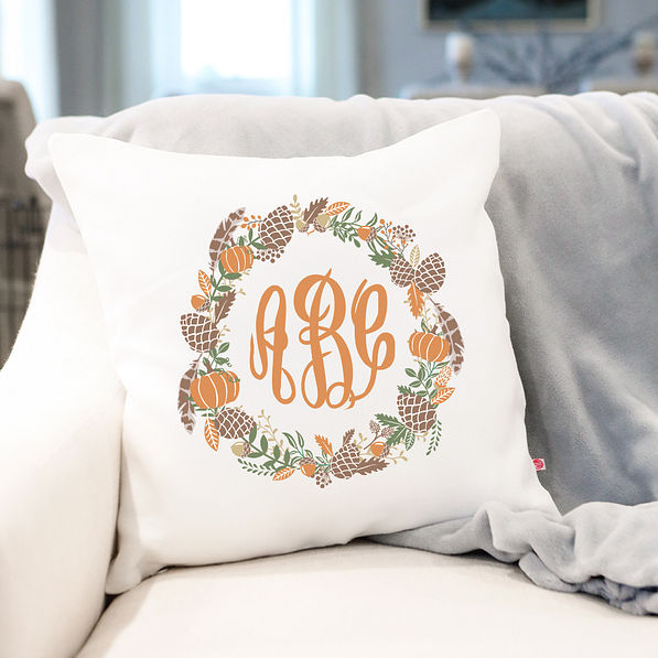 autumn wreath fall pillow on couch
