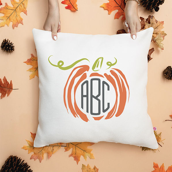 pumpkin fall pillow with leaves