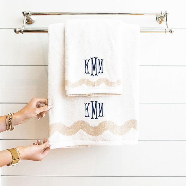 bath towel set hanging with navy fishtail monogram