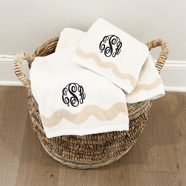 bath towel set in basket with black mcs monogram