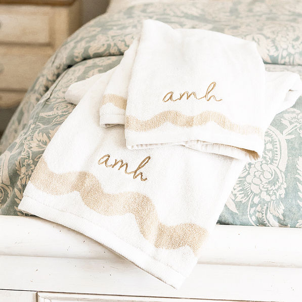 bath towel set on bed