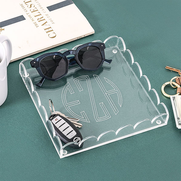 scalloped valet tray with glasses and keys