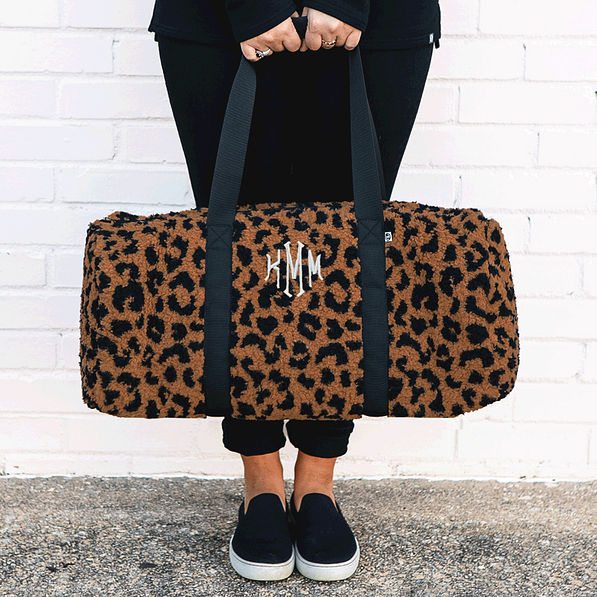 monogrammed leopard sherpa duffel Bag