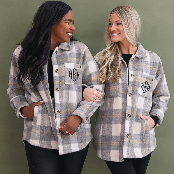 Two Girls Wearing Campfire Shackets