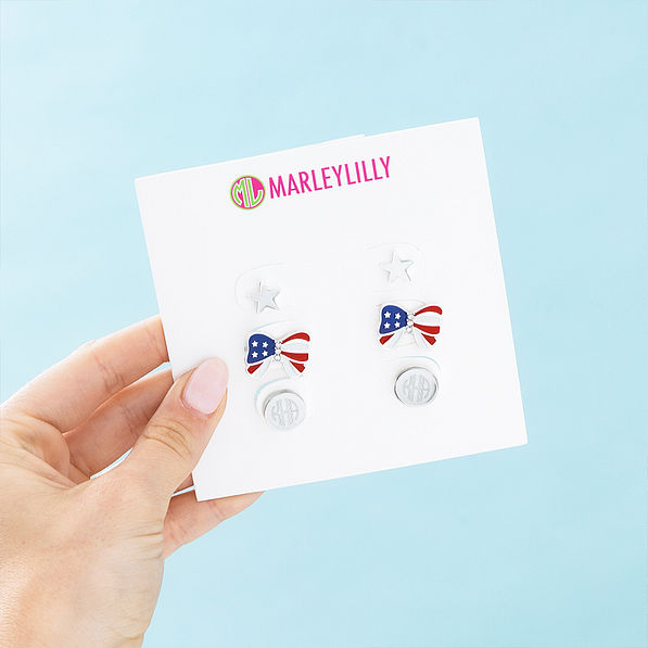 silver patriotic earring set in hand