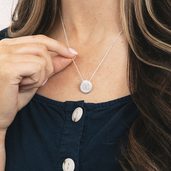 girl wearing nala monogrammed necklace