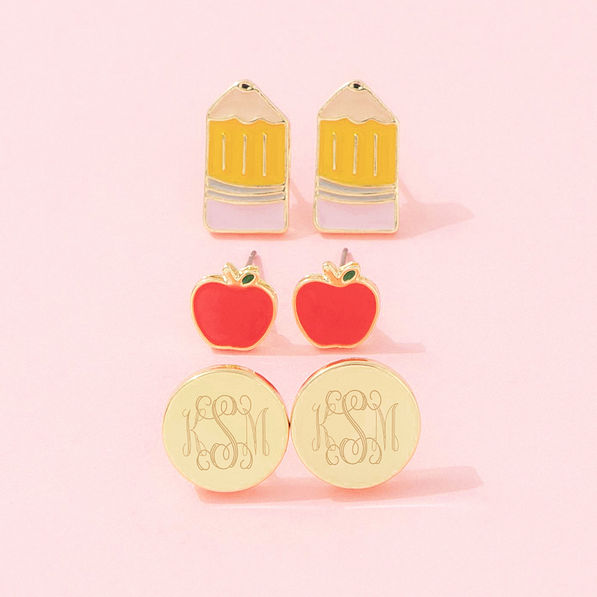 teacher earring set on pink background