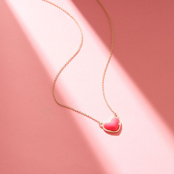 monogrammed heart necklace in light and shadows