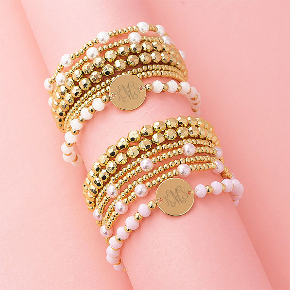 gold and pink beaded monogrammed bracelet stack on pink