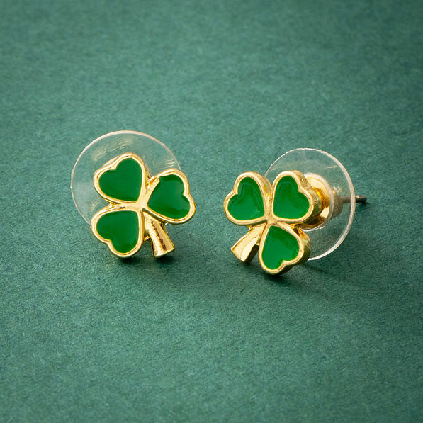 shamrock earrings on green paper