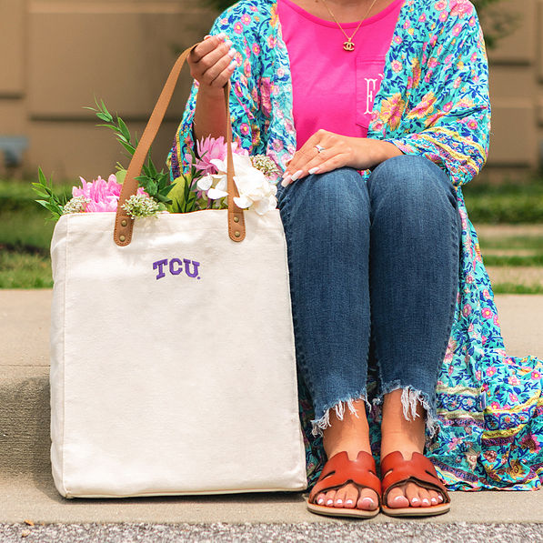 tcu horned frogs ivory canvas tote on sidewalk