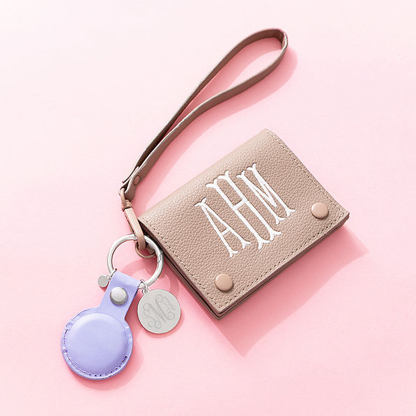 Lavender airtag keychain on card wallet wristlet