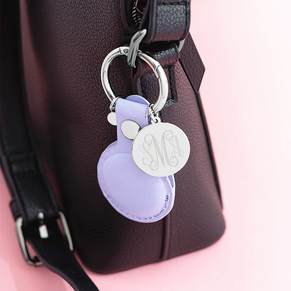 Lavender airtag keychain on purse