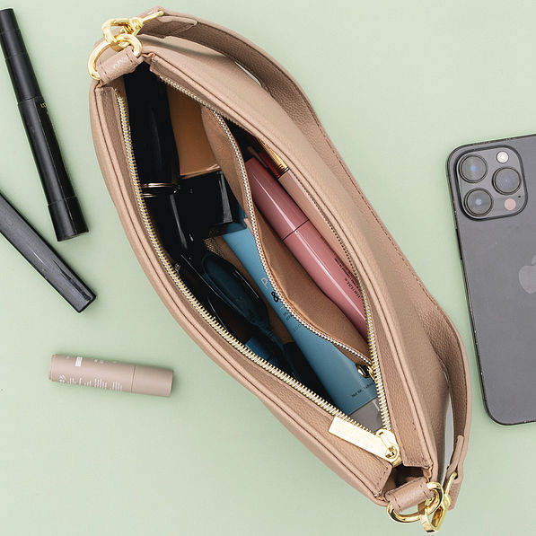 inside of taupe monogrammed shoulder bag