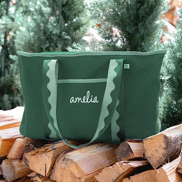 pine anywhere tote bag on logs
