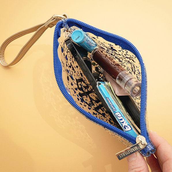 inside of glitter blue wristlet pouch
