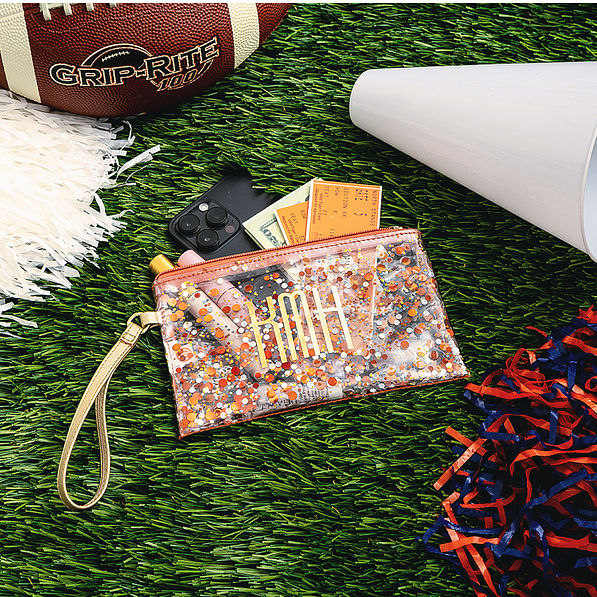 orange monogrammed glitter wristlet pouch with gameday accessories
