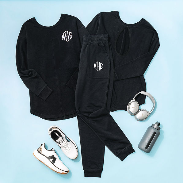 black monogrammed joggers with open back sweatshirt