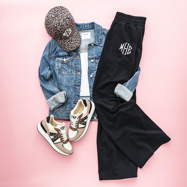wide leg pants flatlay on pink background