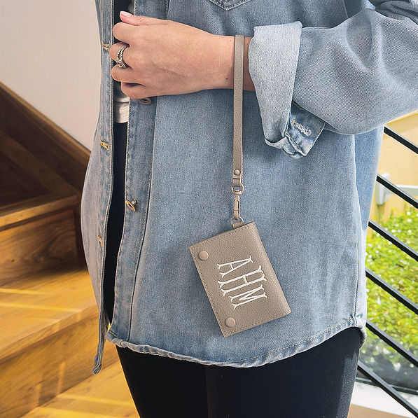 monogrammed card holder wristlet on wrist