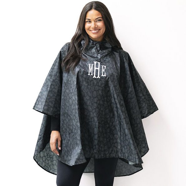 girl wearing monogrammed onyx leopard poncho close up