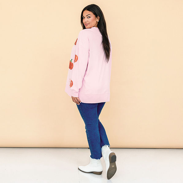 pink pumpkins sequin fall sweatshirt on julia ann back view