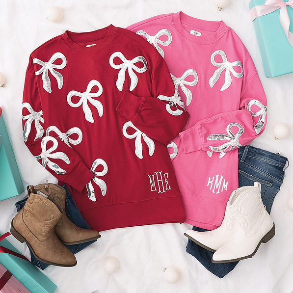 crimson and hot pink sequin bow sweatshirt flatlay