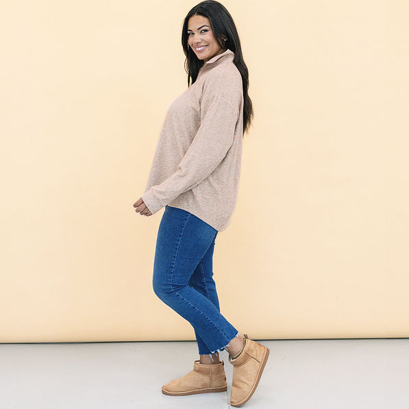 side of monogrammed heathered fleece pullover in tan