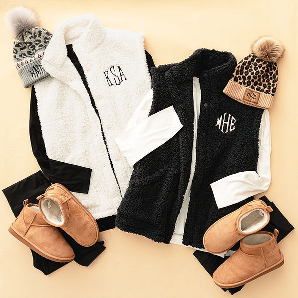 duo sherpa vests flatlay