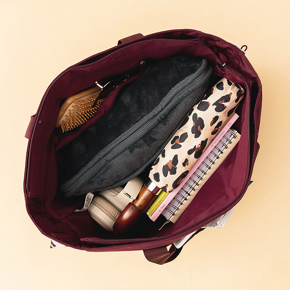 inside of burgundy carry on tote