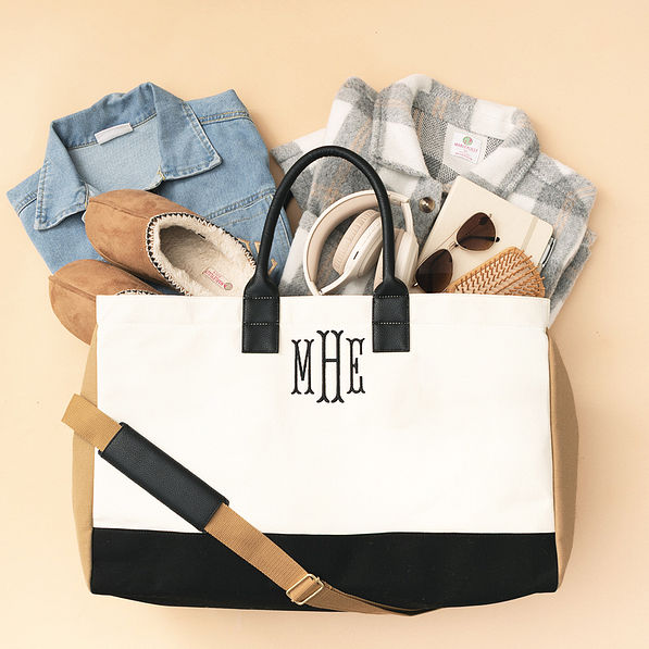 monogrammed ivory upscale weekender packed