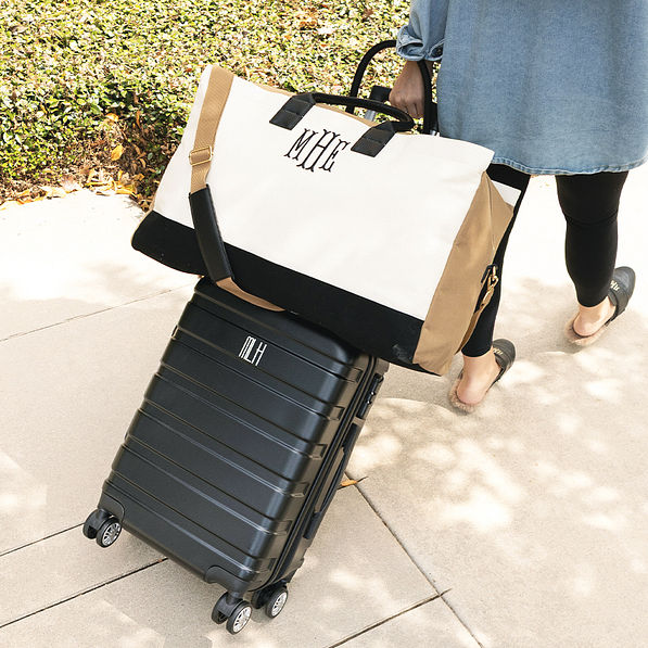 monogrammed upscale ivory weekender with trolley luggage strap