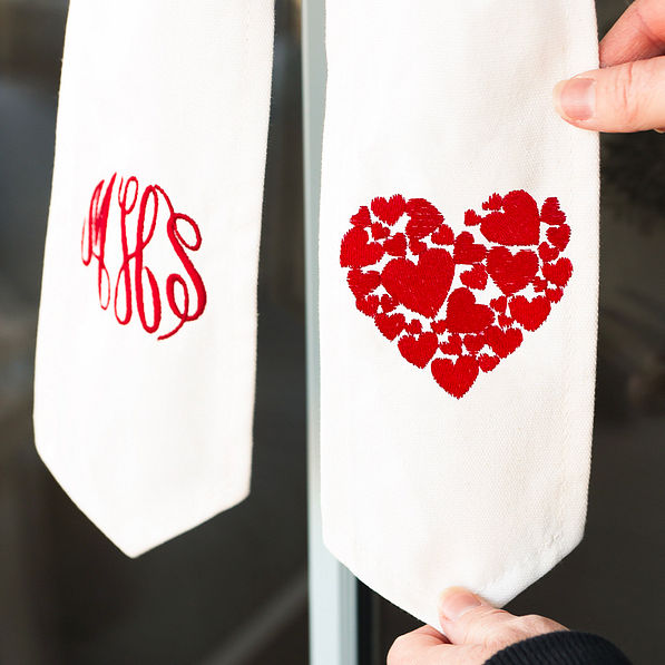 close up detail of red heart embroidery